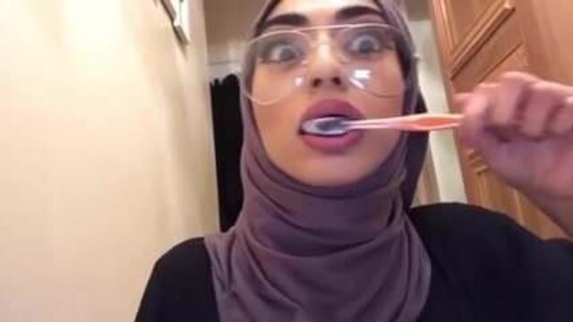 Hijabi Brushing her Pretty Teeth