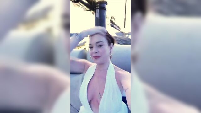 Lindsay Lohan (Cleavage) Nip Slip
