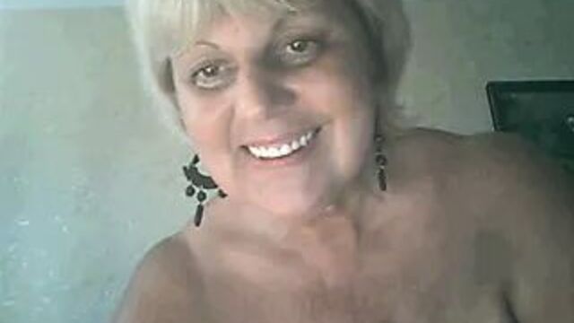 Grandma takes her tits out